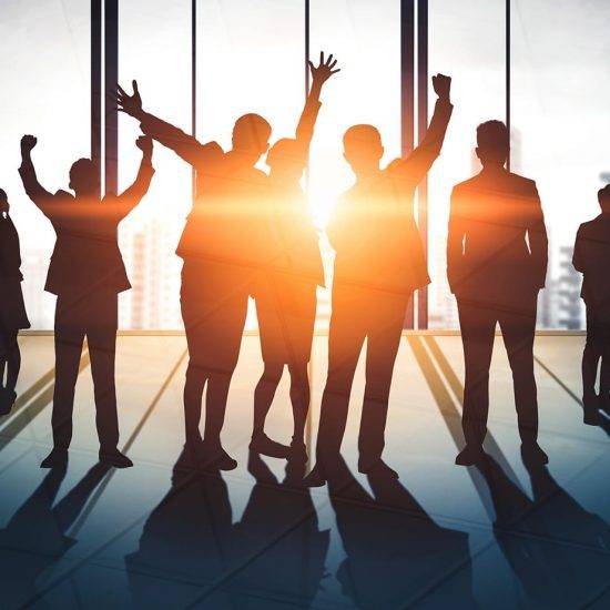 Double Exposure Image of Many Business People. Double exposure image of many business people conference group meeting on city office building in background showing partnership success of business deal. Concept of teamwork, trust and agreement.